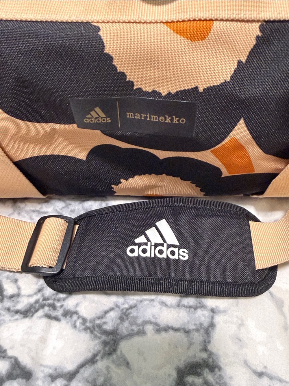 Adidas x Marimekko Printed Duffel Bag in Beige & Black - Picture 3 of 8